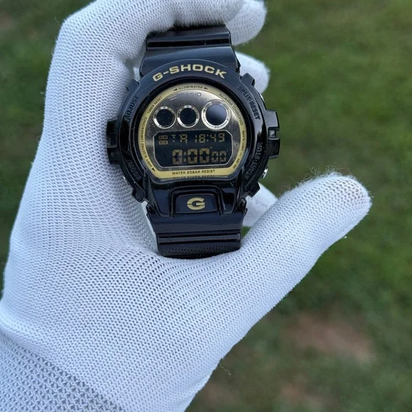 G-SHOCK Black and Gold Digital Watch men’s